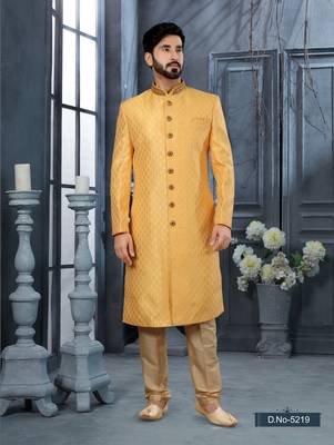 Yellow havy jackard with zari hand work  indo western sherwani 1