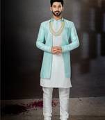 Firozi and off white havy classic sherwani with thread embroidered n stones work over the sherwani & kurta