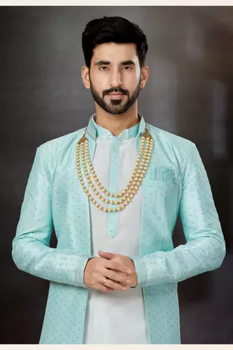 Firozi and off white havy classic sherwani with thread embroidered n stones work over the sherwani & kurta