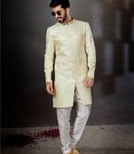 Cream  havy classic indowestern sherwani with stone zari work with fansy batton