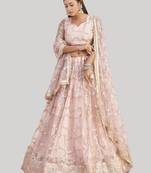 Prominent Pastel Pink Sequins Embroidered Net Wedding Lehenga Choli