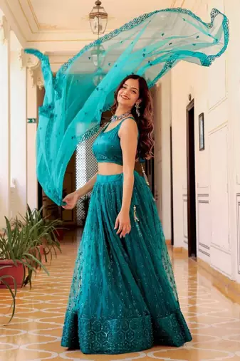 Dazzling Teal Green Sequins Embroidered Net Indian Lehenga Dress Designs