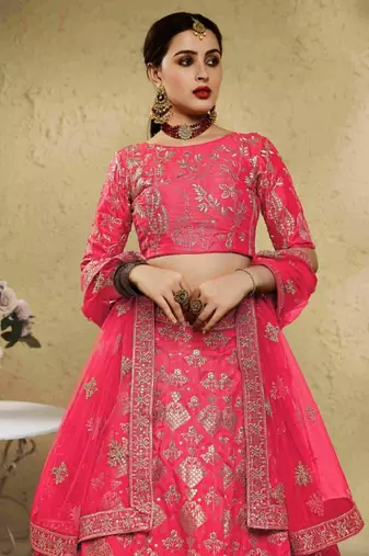 Fascinating Peach Sequins And Thread Embroidered Silk Wedding Lehenga Choli Dress