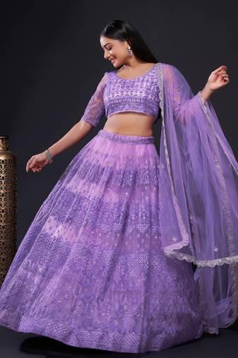 Astonishing Lavender Sequins Embroidered Soft Net Wedding Lehenga Dress