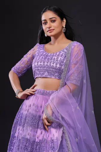 Astonishing Lavender Sequins Embroidered Soft Net Wedding Lehenga Dress