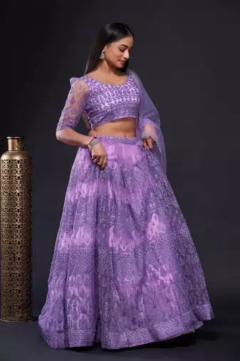 Astonishing Lavender Sequins Embroidered Soft Net Wedding Lehenga Dress