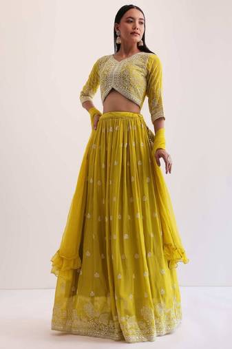 fabulous yellow sequins embroidered georgette haldi wear lehenga choli