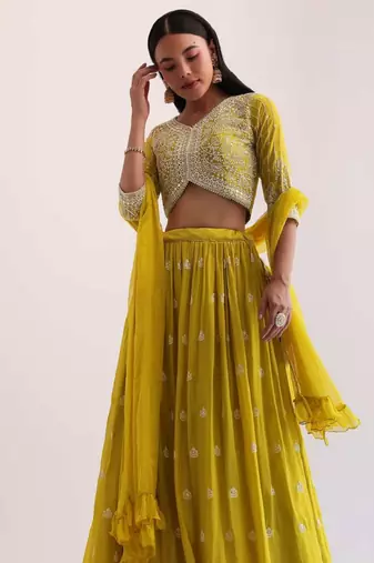 fabulous yellow sequins embroidered georgette haldi wear lehenga choli