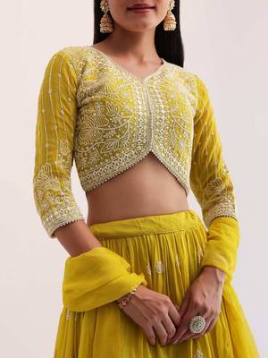 fabulous yellow sequins embroidered georgette haldi wear lehenga choli 3