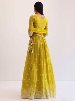 fabulous yellow sequins embroidered georgette haldi wear lehenga choli 4