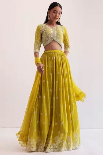 fabulous yellow sequins embroidered georgette haldi wear lehenga choli