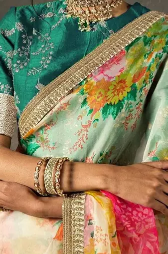 Alluring Cream Floral Orangza Wedding Wear Wedding Saree With Blouse