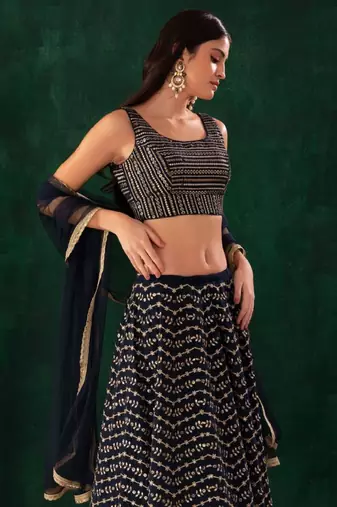 Dazzling Blue Zari And Sequins Embroidered Georgette Wedding Wear Lehenga Choli