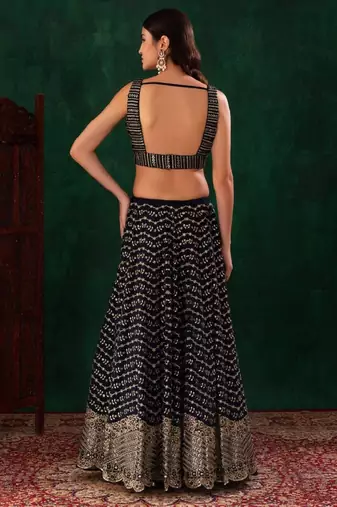 Dazzling Blue Zari And Sequins Embroidered Georgette Wedding Wear Lehenga Choli