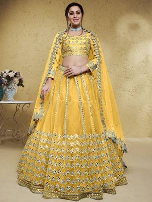 Magnetic Yellow Foil Work Net Ethnic Haldi Wear Lehenga Choli 1