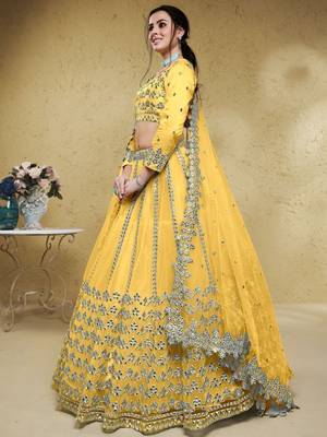 Magnetic Yellow Foil Work Net Ethnic Haldi Wear Lehenga Choli 3
