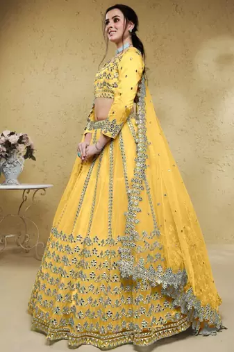 Magnetic Yellow Foil Work Net Ethnic Haldi Wear Lehenga Choli