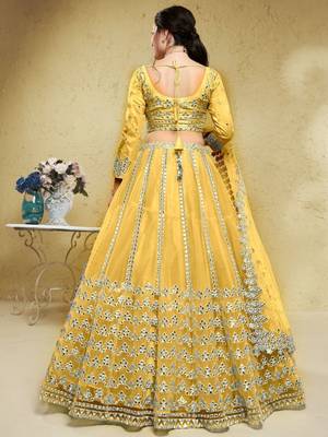 Magnetic Yellow Foil Work Net Ethnic Haldi Wear Lehenga Choli 4
