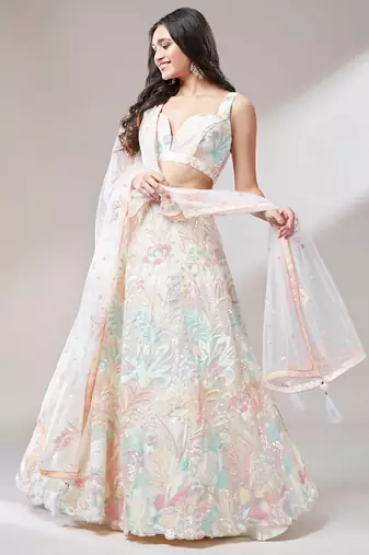 astounding off white sequins embroidered soft net indian wedding wear lehenga choli
