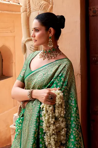 Green color silk blend saree with blouse