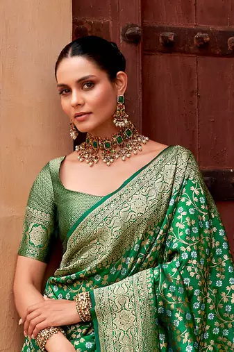 Green color silk blend saree with blouse