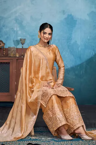 Mesmerizing gold thread and sequins embroidered fendi fabric indian designer salwar kameez