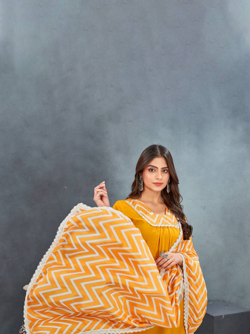 Yellow premium rayon solid kurta with zig zag print pant & dupatta set
