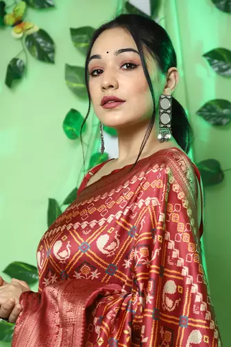 Lustrous red patola art-silk saree