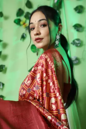 Lustrous red patola art-silk saree
