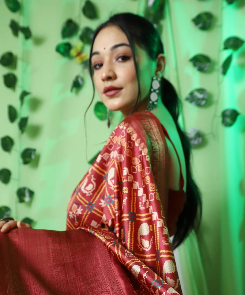 Lustrous red patola art-silk saree