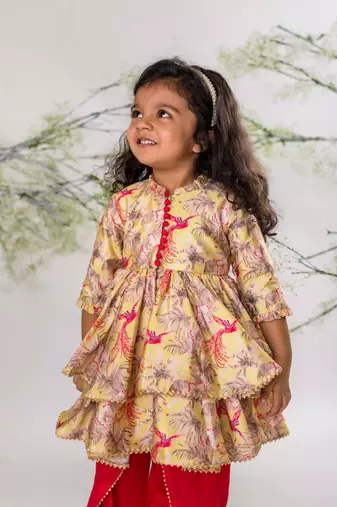 Bird of paradise peplum top with pink dhoti pant set