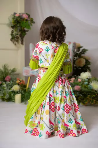 White ikkat blouse with ghaghra and dupatta