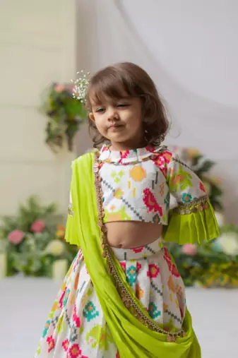 White ikkat blouse with ghaghra and dupatta