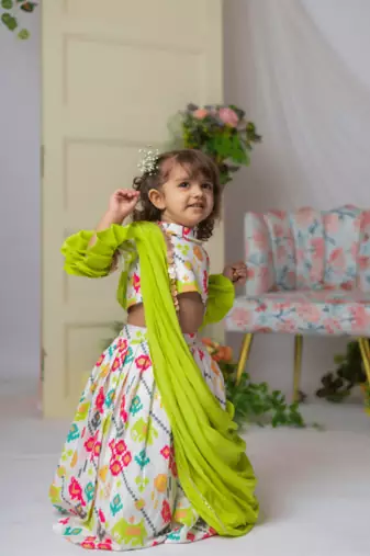 White ikkat blouse with ghaghra and dupatta