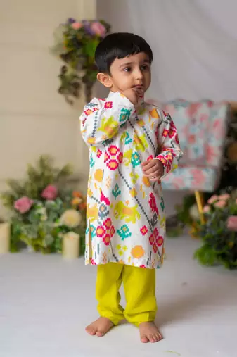 White ikkat kurta with green churidar