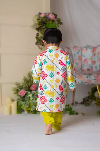 White ikkat kurta with green churidar
