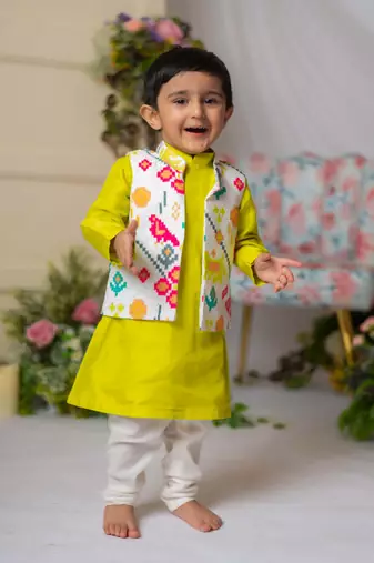 White ikkat nehru jacket with green kurta churidar set