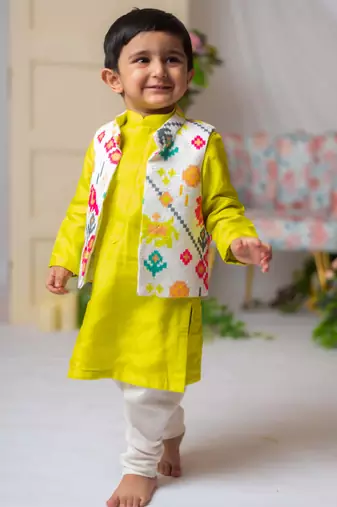 White ikkat nehru jacket with green kurta churidar set