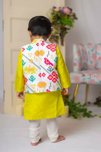White ikkat nehru jacket with green kurta churidar set