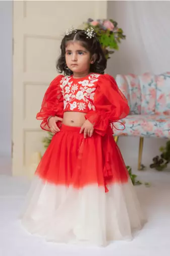 Red and white embroidered blouse with ghaghra and dupatta