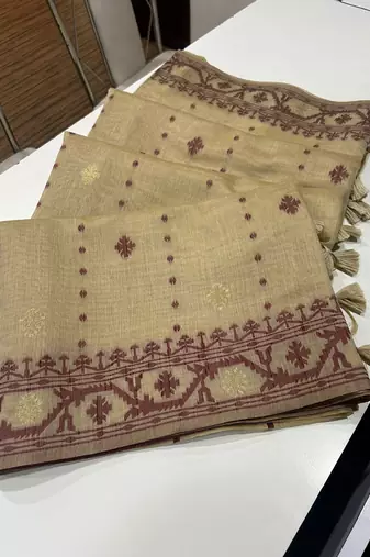 Cream soft muga cotton weaving saree with zari woven butties