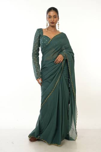  bottle green handloom mul cotton saree with golden scalloped border