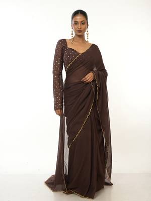 brown green handloom mul cotton saree with golden scalloped border 1