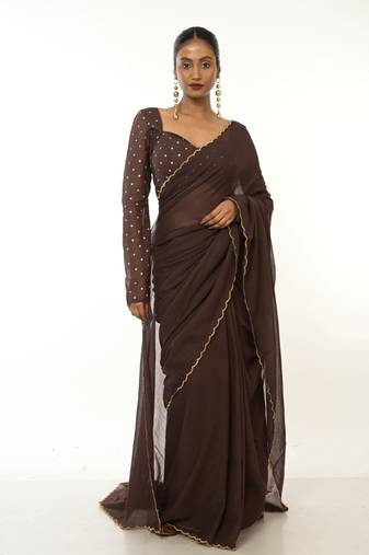 brown green handloom mul cotton saree with golden scalloped border