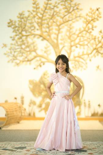 Pink colored baby girl gown for birthday