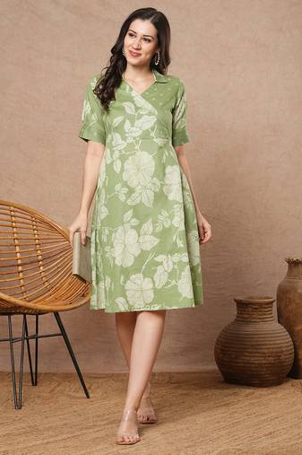 Fit and flare dress with mock overlap yoke, half sleeves with centre pleat.