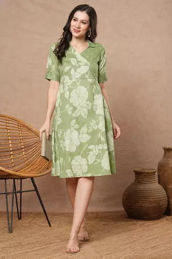 Fit and flare dress with mock overlap yoke, half sleeves with centre pleat.