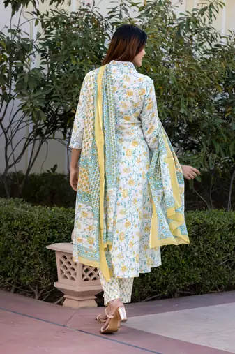 women yellow and white floral print anarkali kurta set with trouser and dupatta