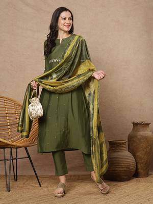 Embroidered a line kurta in silk blend fabric paired with printed silk blend dupatta and pants. 1