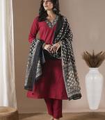 Green a-line kurta set with embroidered v-neck with mustard printed dupatta and pant.